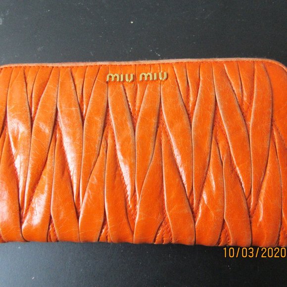 Miu Miu Handbags - EUC Miu Miu Papaya Matelasse Lux Wallet